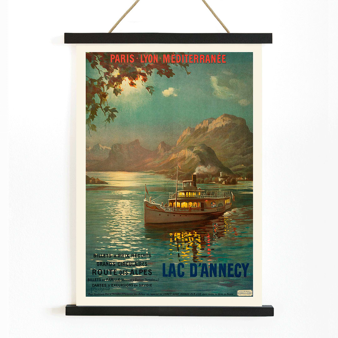 Poster of Lac d Annecy by Francois Charles Cachoud showing a boat on a serene lake with mountains and a glowing evening sky, with wooden magnetic frame on white background