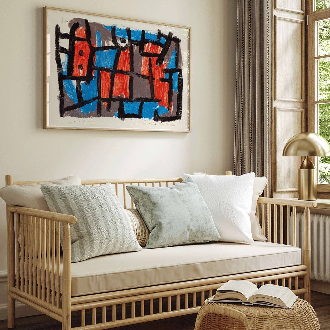 Abstract geometric poster with bold black lines and vibrant red and blue shapes inspired by The Hour Before One Night by Paul Klee, framed and displayed in home decor