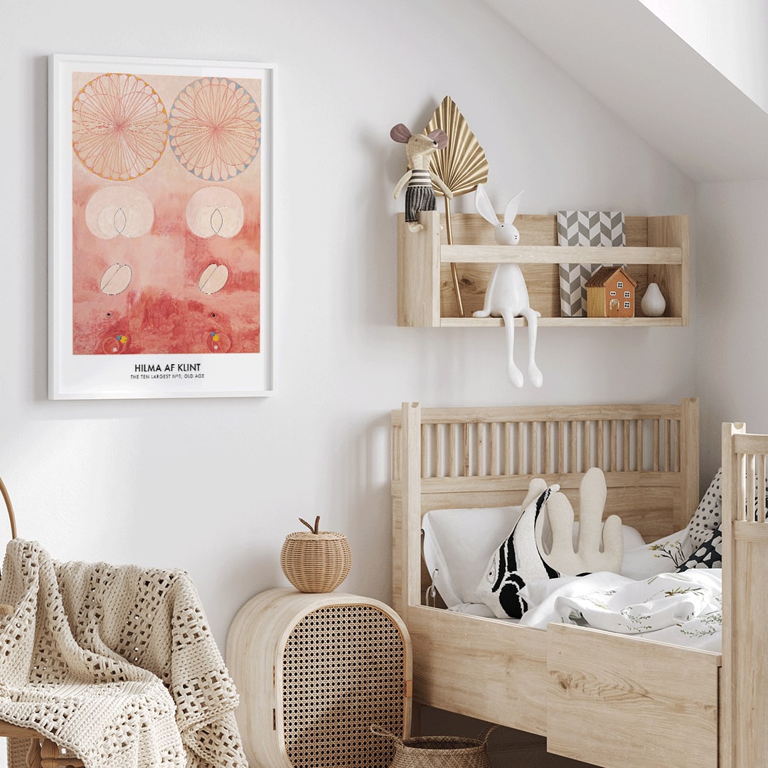 Abstract geometric and circular patterns in pink and orange from The Ten Largest Old Age by Hilma af Klint art poster, framed and displayed in home decor