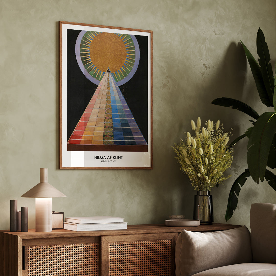 Colorful geometric abstract art poster with radiant circle pyramid and sun motif by Hilma AF Klint Altarpiece No 1 Group X, framed and displayed in home decor