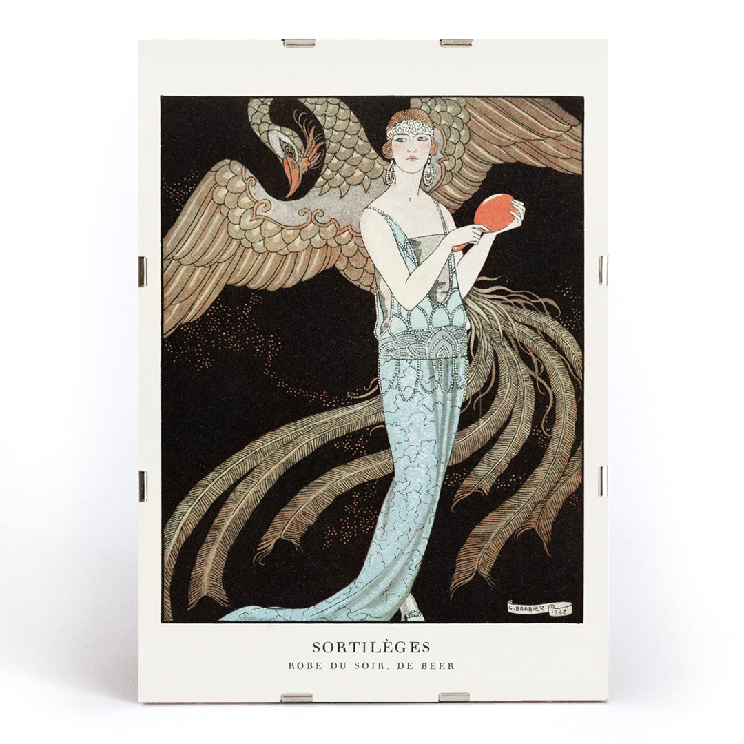Elegant woman in blue evening dress with majestic bird Sortileges Evening dress by George Barbier art deco poster, framed and displayed in modern living room decor