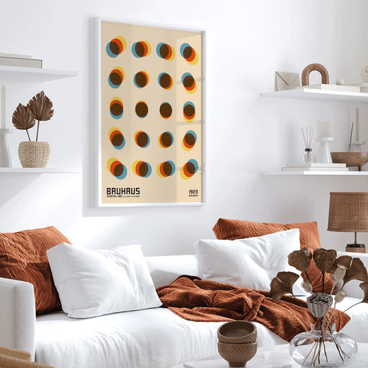 Bauhaus Poster 9 Inspired by the Weimar Exhibition with overlapping colorful circles in a geometric pattern on a beige background, framed and displayed in home decor