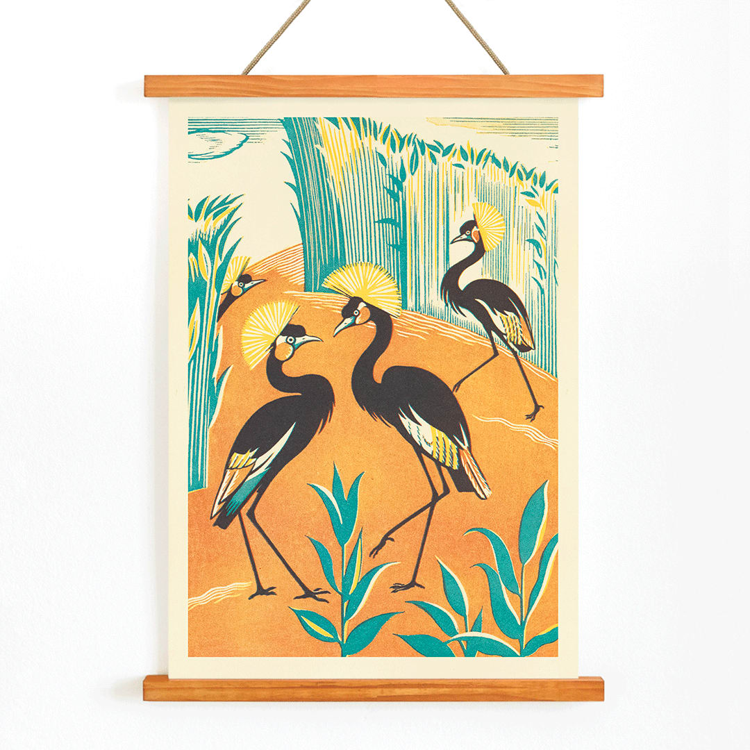Colorful exotic birds and stylized plants in a jungle setting by Clifford Webb from A Jungle Picnic Pl15 poster with orange and green background, with wooden magnetic frame on white background