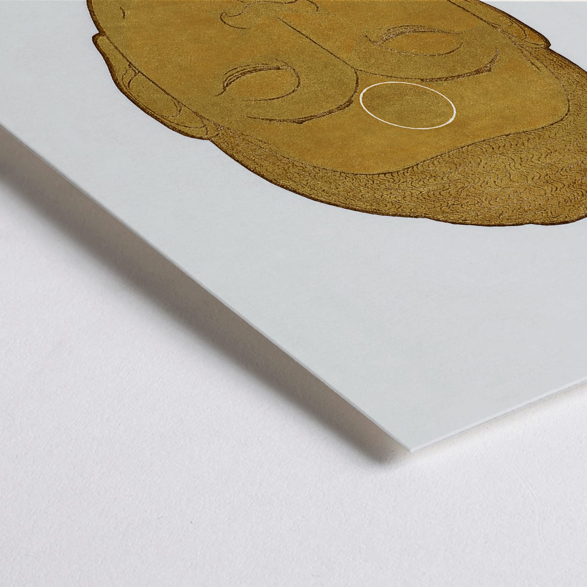 Closeup detail of Serene golden Buddha head artwork with closed eyes by Reijer Stolk titled Head of Buddha on white background