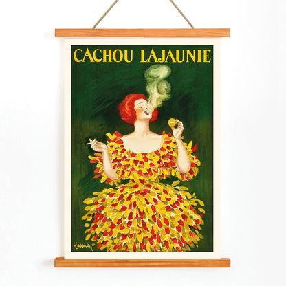 Colorful poster Cachou Lajaunie by Leonetto Cappiello featuring a woman in a vibrant dress with smoke forming a face and holding a cigarette, with wooden magnetic frame on white background