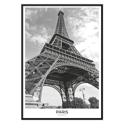 Black and white picture of the Eiffel Tower in Paris featuring its intricate structure by artist poster titled Tour Eiffel Black and White, with black aluminium frame on white background