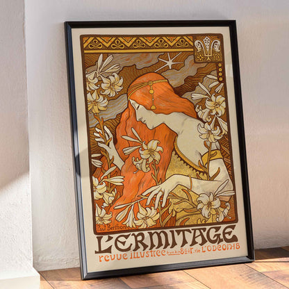 Paul Berthon LErmitage poster with red-haired woman, lilies and floral Art Nouveau ornament, framed and displayed in modern living room decor