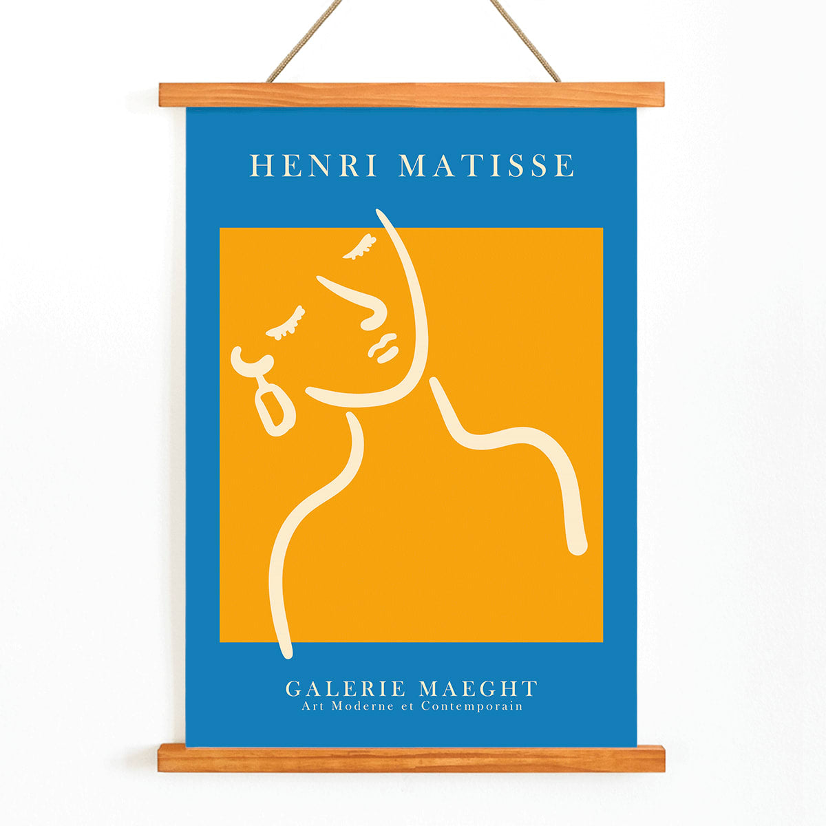 Henri Matisse poster of abstract girl with earring in orange and blue from Galerie Maeght artwork, with wooden magnetic frame on white background