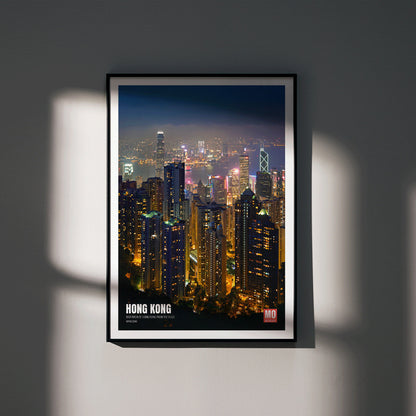 Hong Kong Nightview by Mo Art Gallery featuring a vibrant illuminated city skyline and skyscrapers at night, framed and displayed in modern living room decor