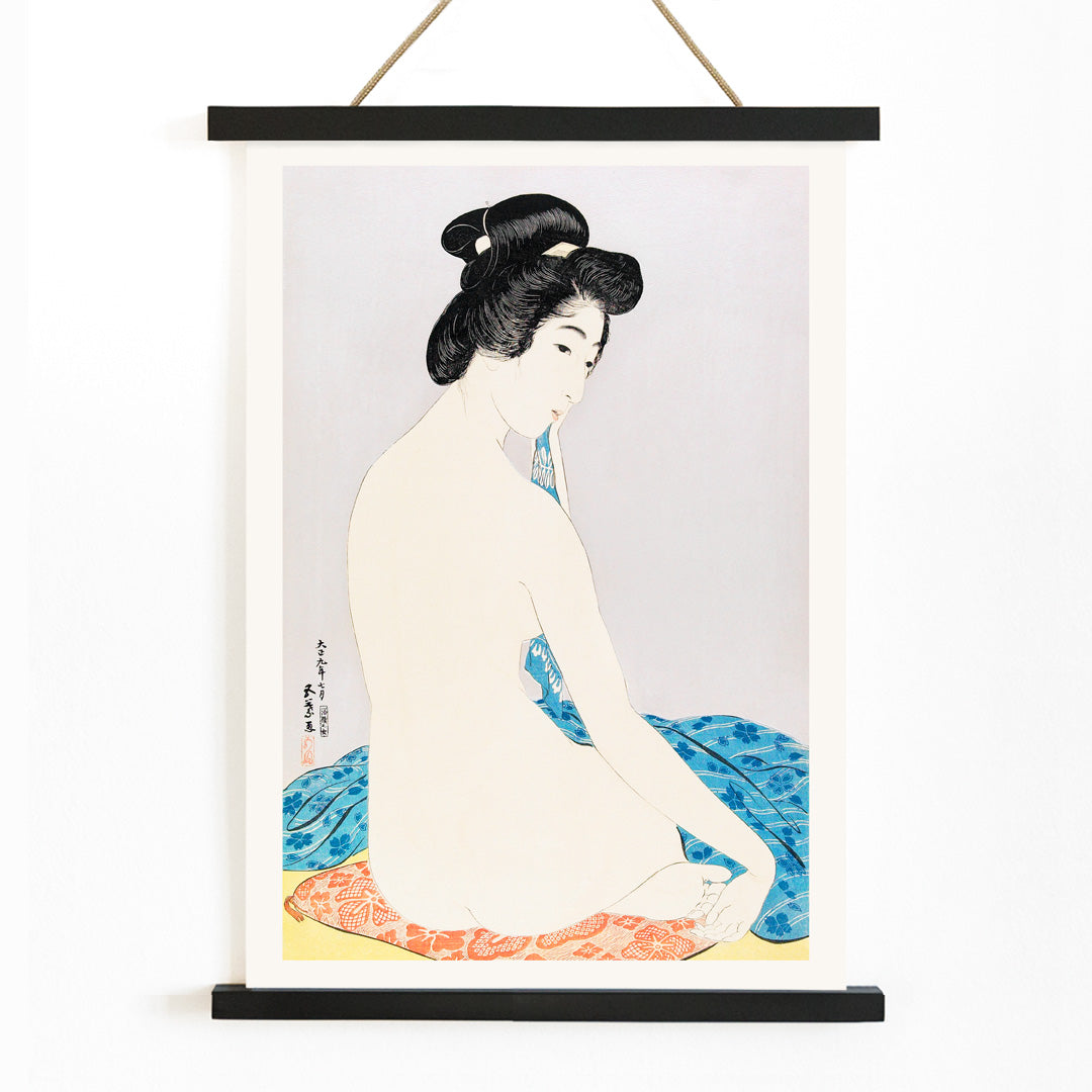 Japanese woman sitting with towel and nude woman on colorful fabrics in Woman After a Bath by Goyo Hashiguchi poster, with wooden magnetic frame on white background