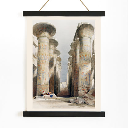 Ancient Egyptian columns and hieroglyphs in Great Hall at Karnak temple in Thebes artwork and poster illustration by David Roberts showing ruins, with wooden magnetic frame on white background