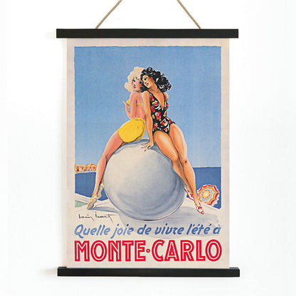 Monte Carlo artwork by Louis Icart showing two women in swimsuits sitting on a large ball at the beach poster, with wooden magnetic frame on white background
