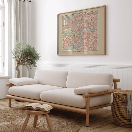 Ancient map of London by Bibliographic institute of Liepzig showing detailed vintage city streets river Thames and parks, framed and displayed in home decor