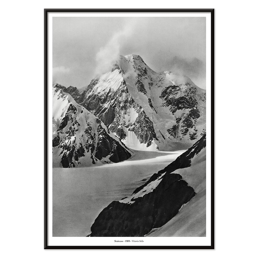 Snow covered mountain landscape by Vittorio Sella Staircase vue prise au dessus du glacier Godwin Austen poster artwork, with black aluminium frame on white background