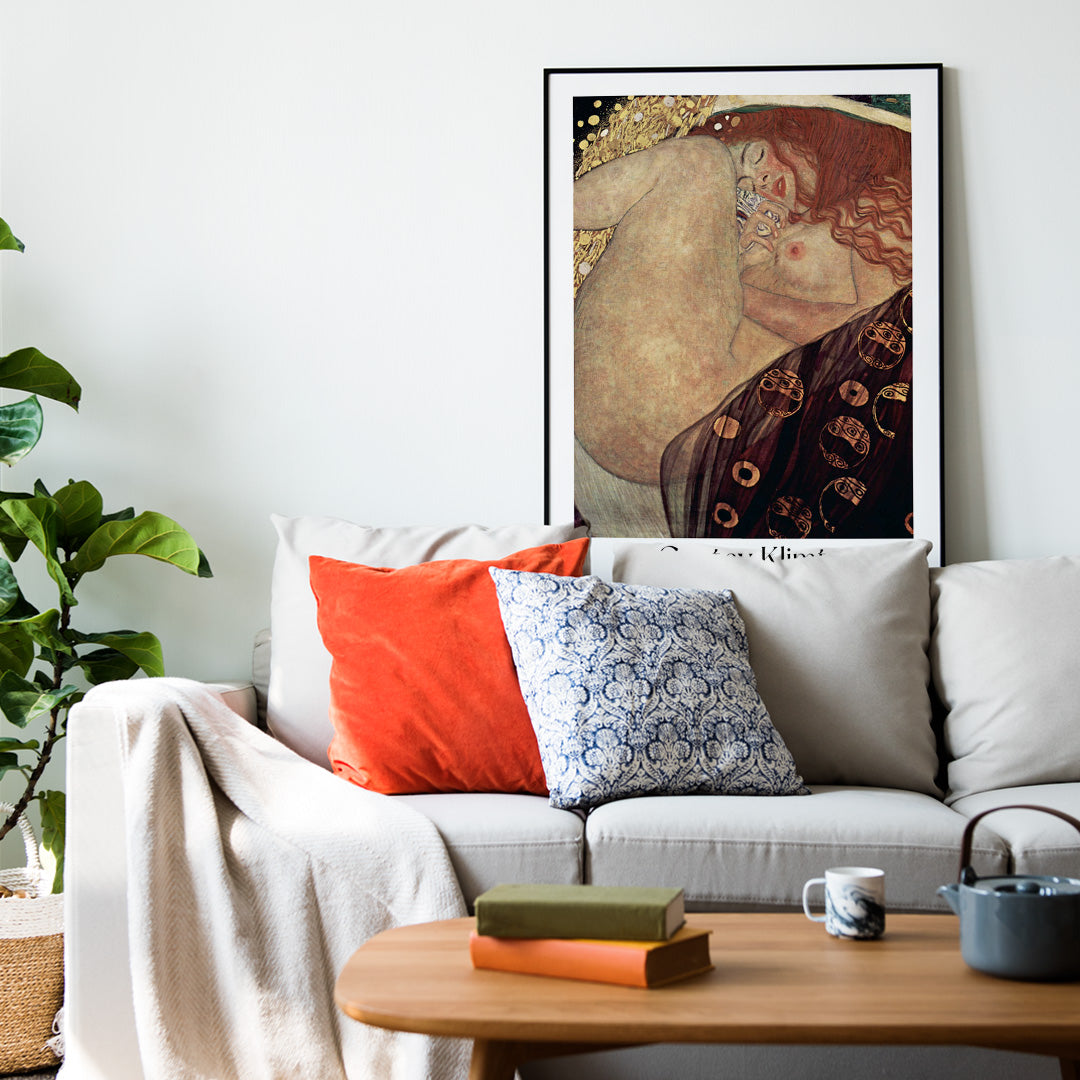 Danae by Gustav Klimt sensual reclining woman artwork in golden tones with rich decorative brown elements poster, framed and displayed in home decor