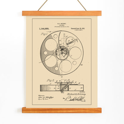 Vintage film reel patent illustration and schematic artwork by M G Delaney for wall art decor, with wooden magnetic frame on white background