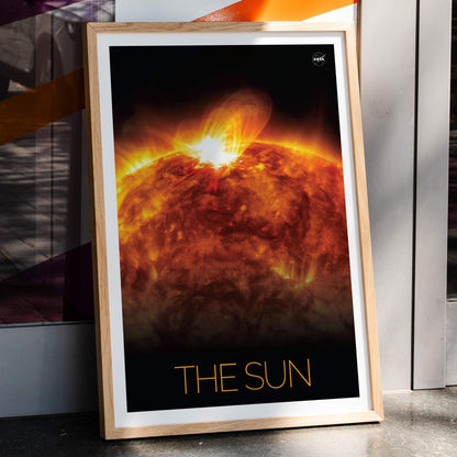 Vibrant NASA artwork of the Sun with solar flares titled The Sun 1 fiery depiction and poster, framed and displayed in home decor