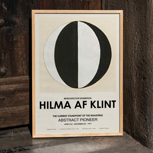 Abstract artwork The Current Standpoint of the Mahatmas by Hilma Af Klint featuring geometric shapes and a black and white abstract circular design poster, framed and displayed in home decor