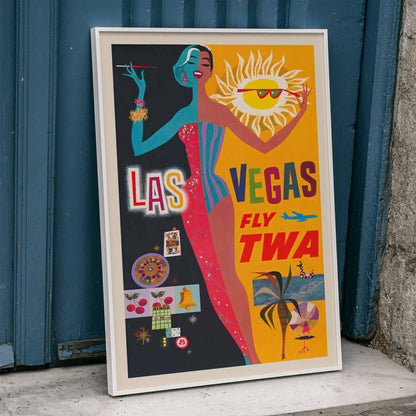 Colorful vintage Las Vegas travel poster by David Klein featuring showgirl stylish woman sun and casino imagery promoting Las Vegas fly TWA, framed and displayed in home decor