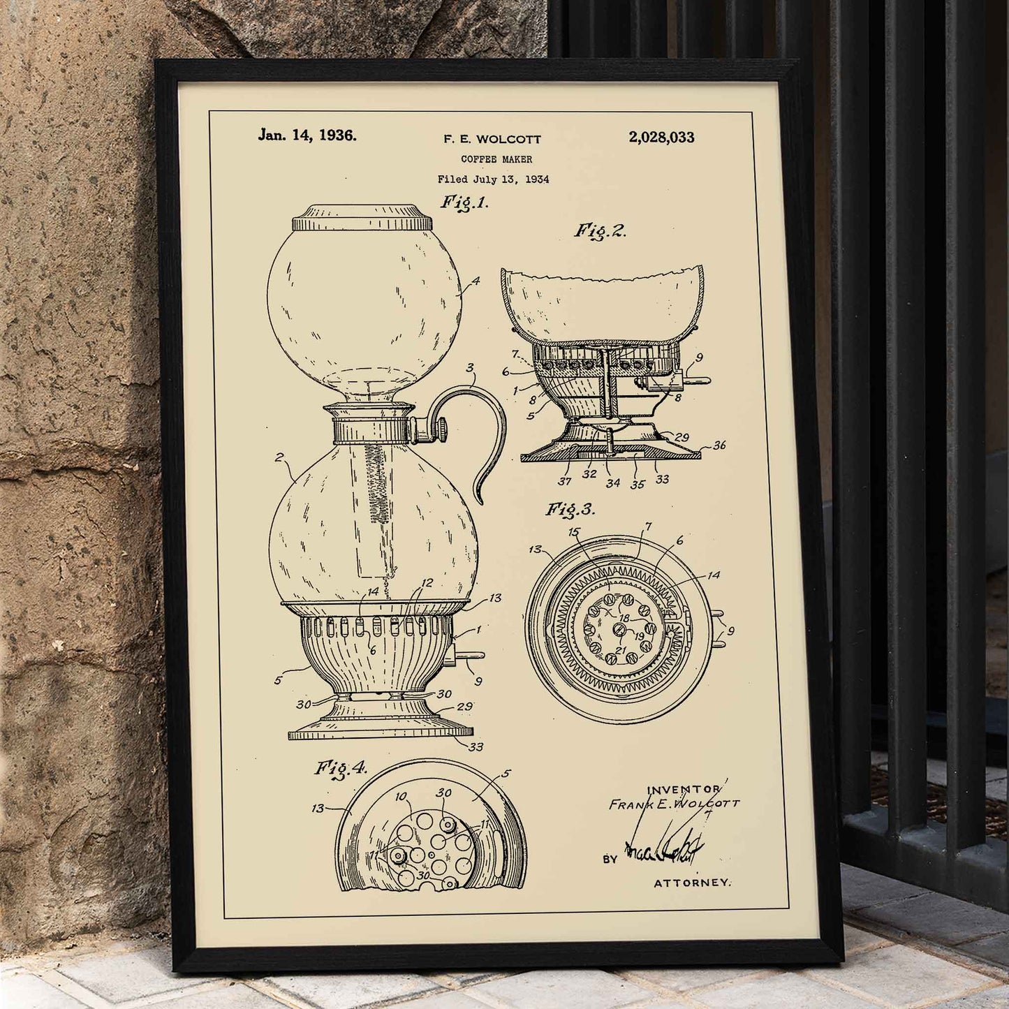 Vintage patent drawing and blueprint poster of Coffee Maker by F E Wolcott featuring detailed diagrams, framed and displayed in home decor