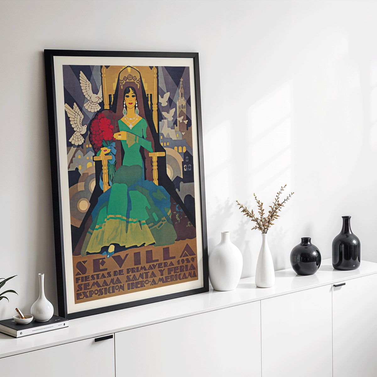 Art Deco illustrated poster of Sevilla Fiestas de primavera by artist featuring Semana Santa Feria Exposición Ibero-Americana and a woman in a green dress with doves and cityscape in the background, framed and displayed in home decor