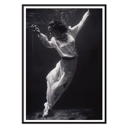 Black and white artwork of a fashion model floating underwater in dolphin tank Marineland Florida by Toni Frissell, with black aluminium frame on white background